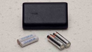 A picture of portable phone battery, AA, and AAA batteries.