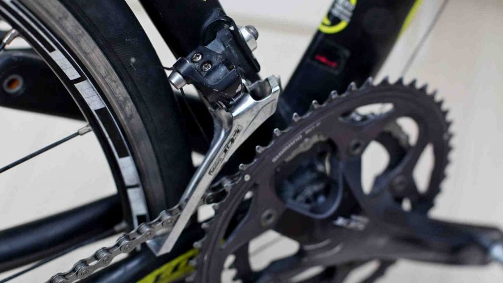A picture of a bike's front derailleur.
