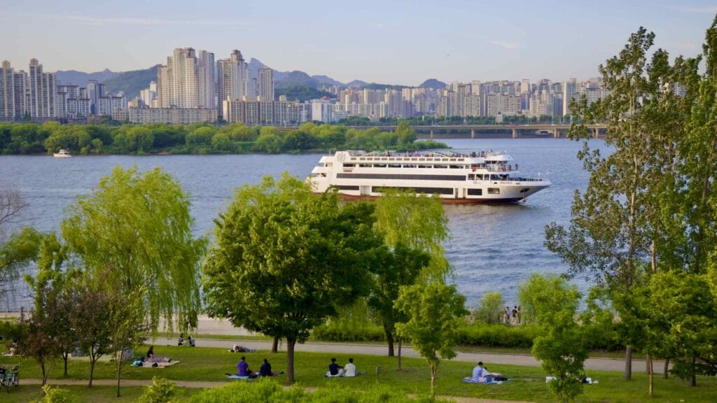 A picture of Bamseom Island (밤섬) and a Hyundai Cruise ship near Yeouido Hangang Park (여의도한강공원) in Seoul, South Korea.