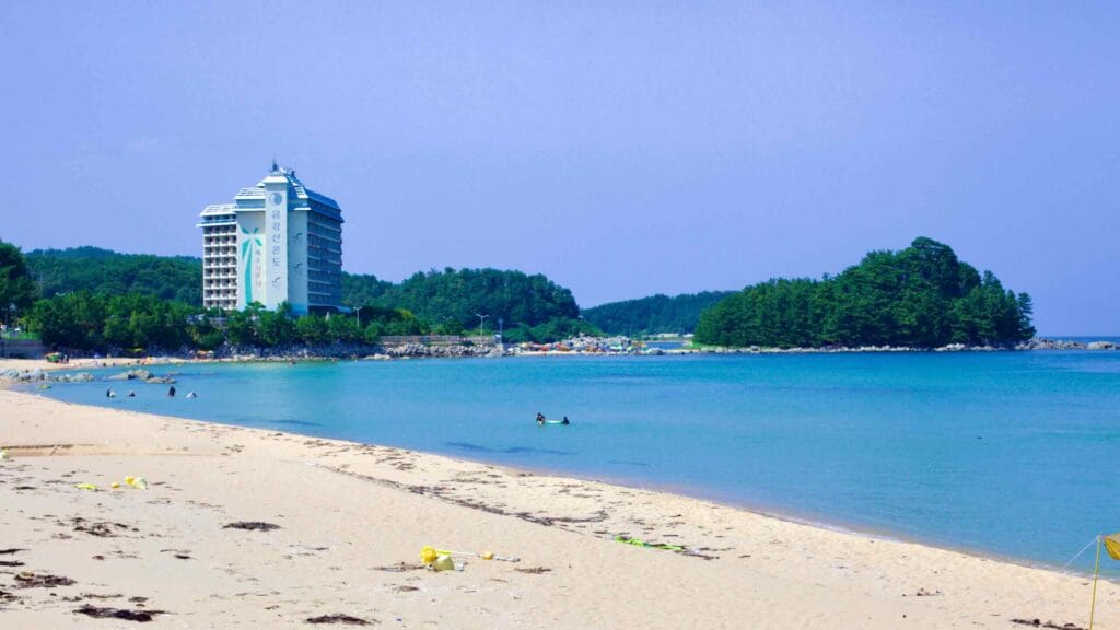 A towering hotel on the edge of Machajin Beach, marks the northernmost beach on Korea's east coast.