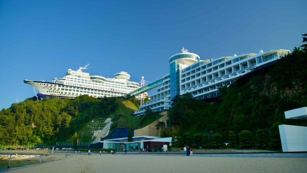 The Sun Cruise Resort, designed to resemble a cruise ship, stands on a hilltop overlooking Jeongdongjin Beach.