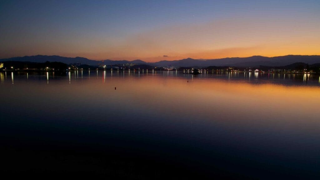 A twilight view over Gyeongpodae Lake in Gangneung.