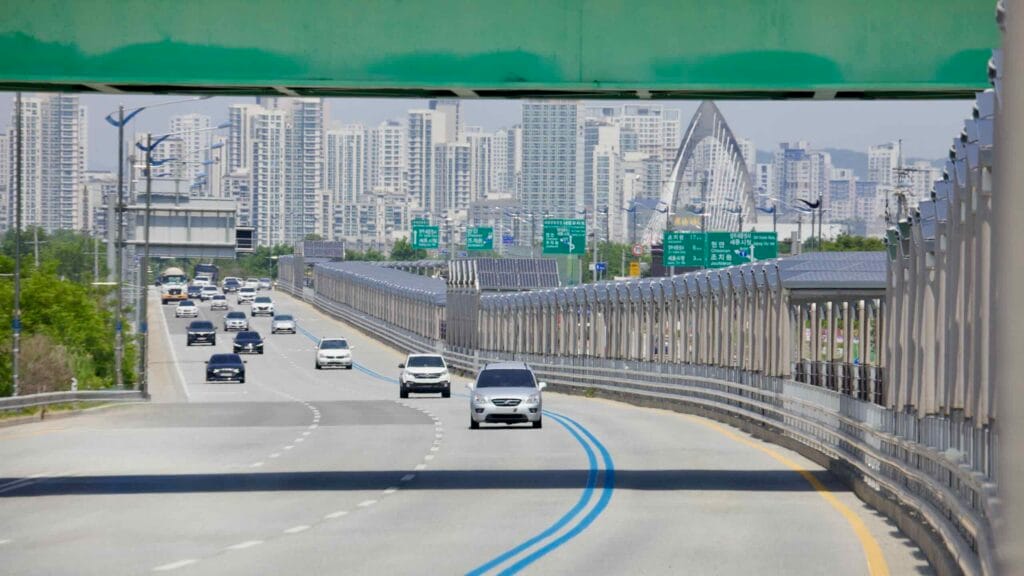 Vehicles travel along North Star Road while a solar-covered bike path runs parallel.