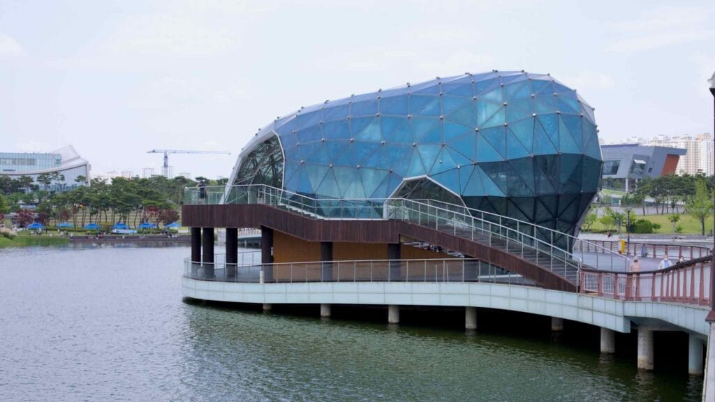 A close-up view of the geodesic dome on Stage Island at Sejong Lake Park, an architectural landmark.