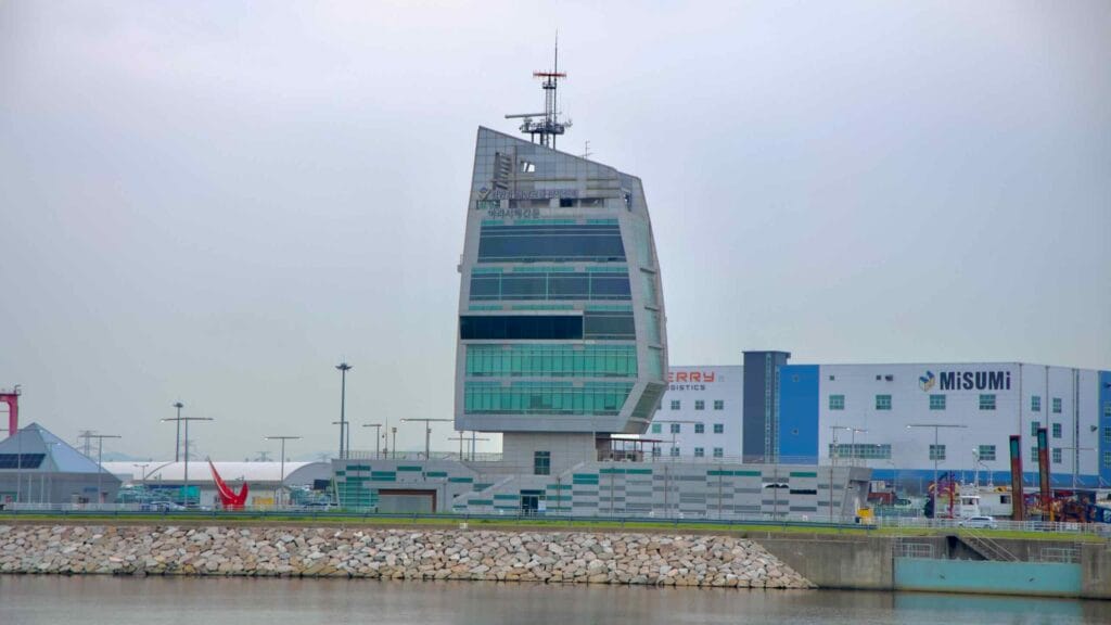 The control tower of the Ara West Sea Lock stands over the Gyeongin Ara Waterway, managing vessel traffic at the entrance to Korea’s first inland canal connecting Seoul and the Yellow Sea.