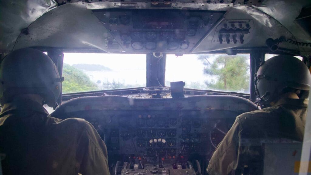Detailed cockpit of a presidential aircraft with mannequin pilots at Gangneung Unification Park.