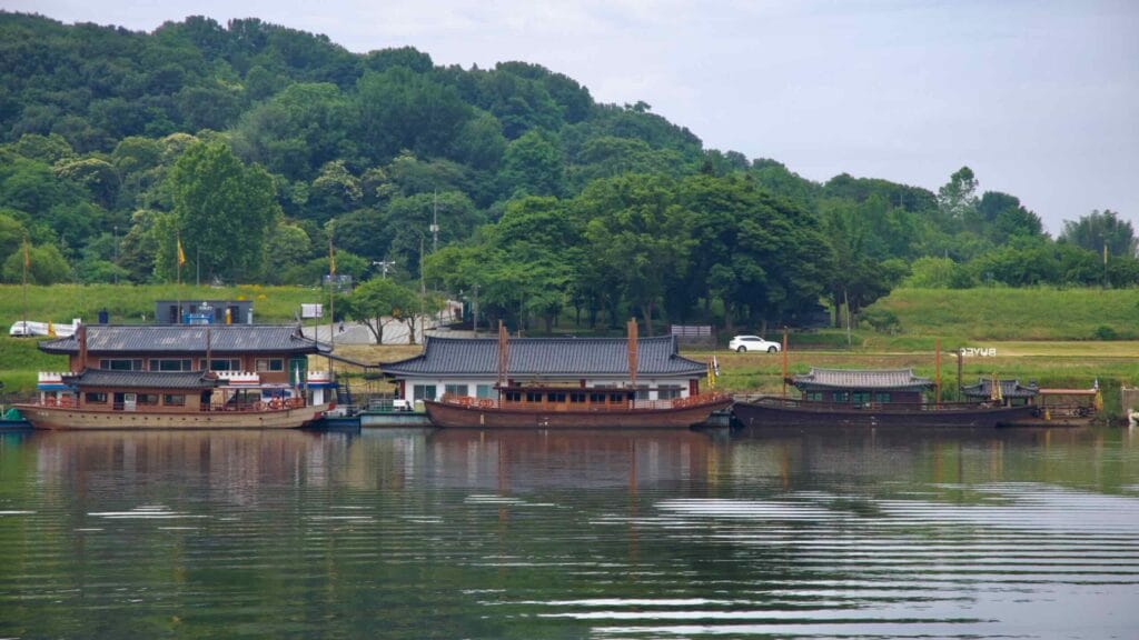 Traditional wooden Goma ferries moored on the Geum River.