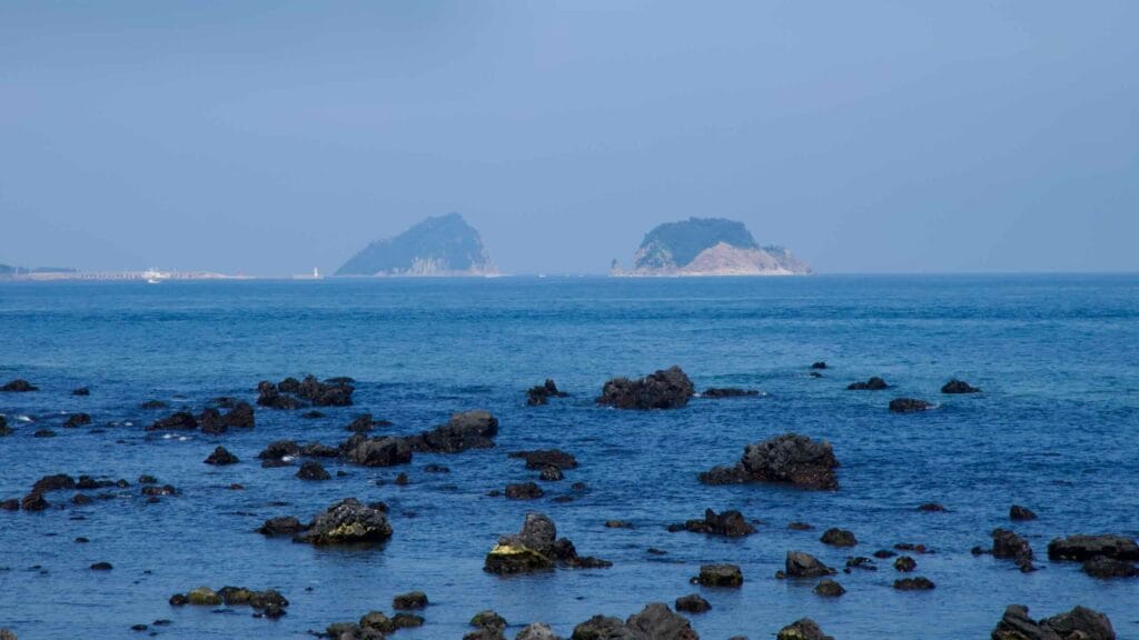 Munseom Island rises from the sea off Seogwipo’s volcanic coast.