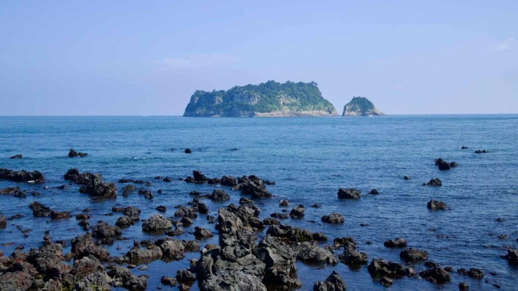 Beomseom Island and a nearby islet rise above blue waters.