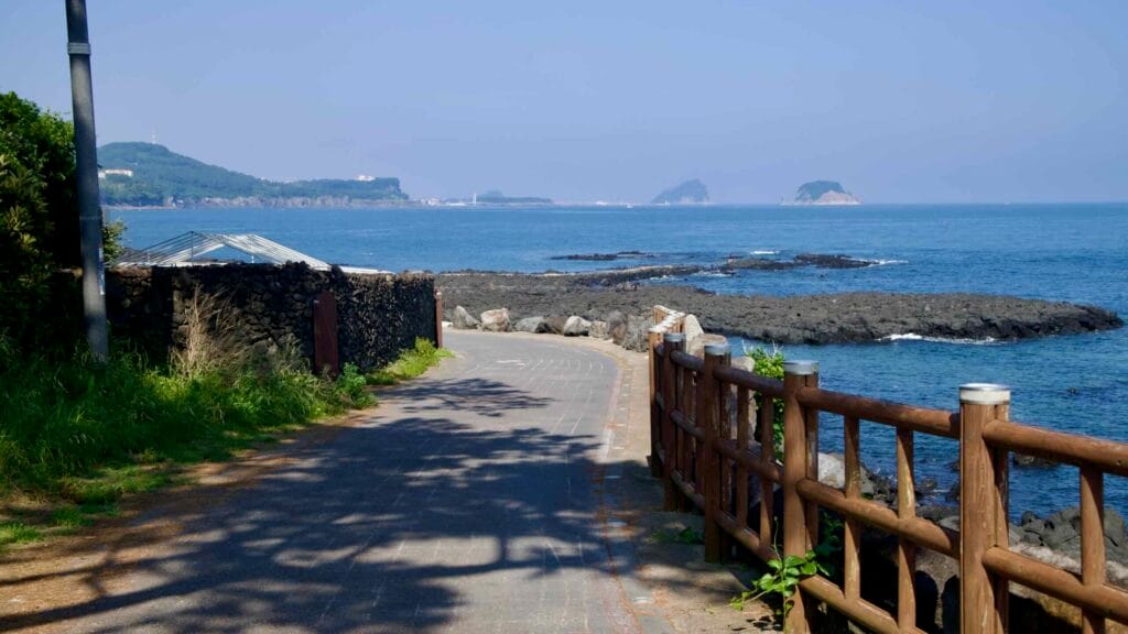A coastal path runs along Beophwan with Munseom in view.