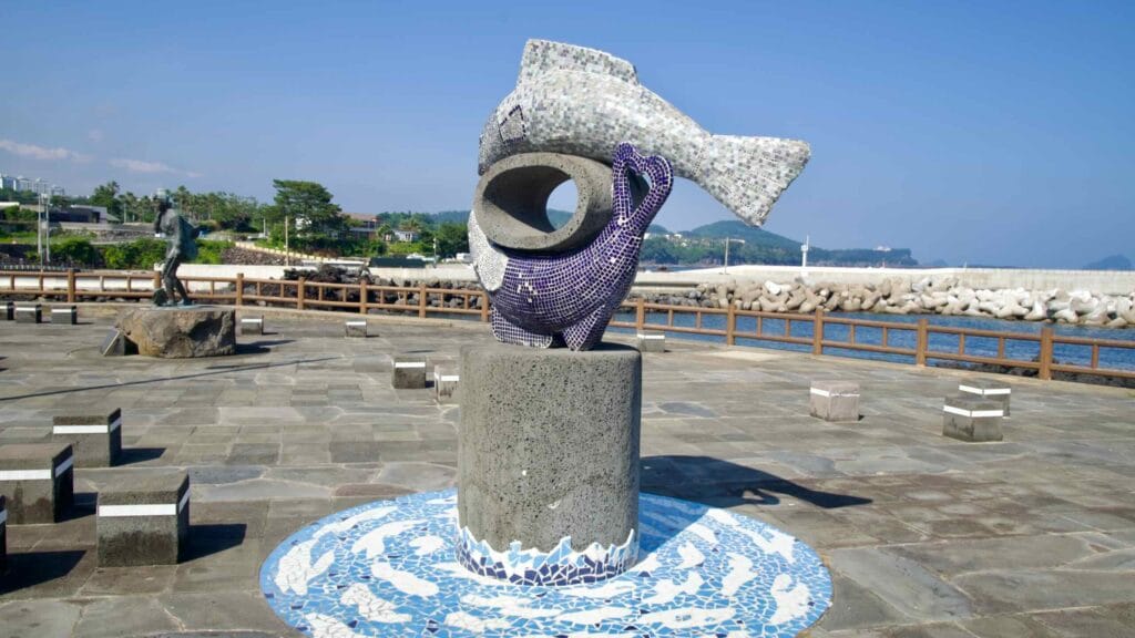 A mosaic fish sculpture decorates Jamnyeo Square in Beophwan.