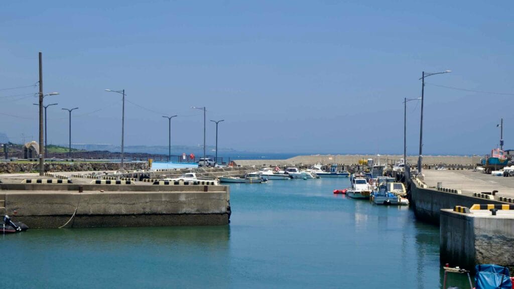 Fishing boats fill the sheltered inlet at Onpyeong Port.