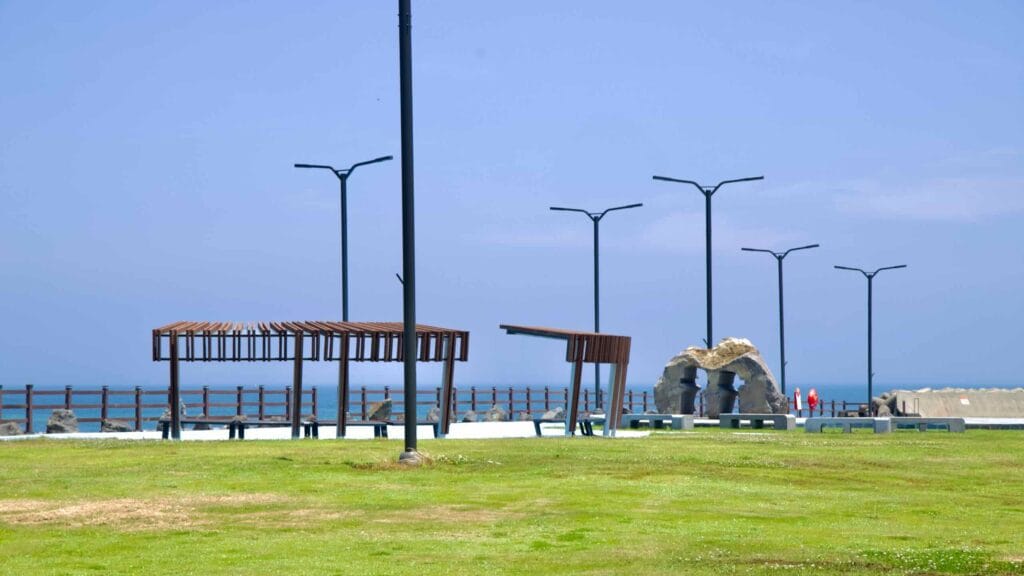 Shade structures and a promenade face the sea at Onpyeong.