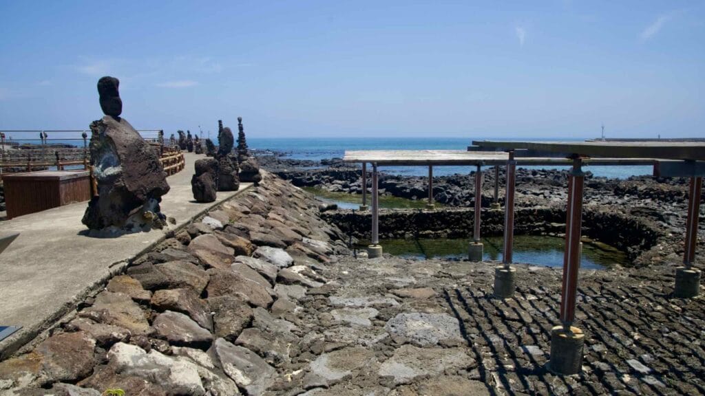 Tidal pools and sculptures line the shore at Onpyeong.