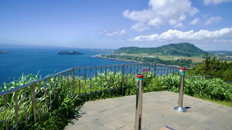 Coastal overlook on Suwolbong with views toward Chagwido and offshore wind turbines.