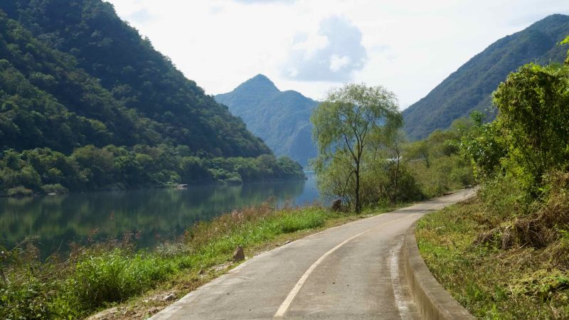 A riverside curve of the Bukhangang Bike Path reflects the surrounding hills.