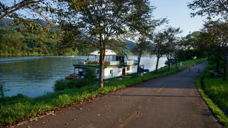 A floating café is moored along the bike path on the North Han River at Gapyeong.