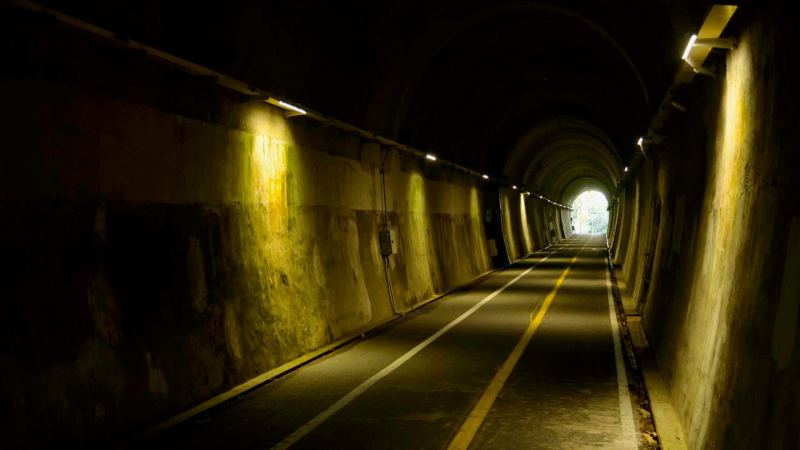 The interior of Saekhyeon Tunnel frames the Bukhangang path in Namyangju.