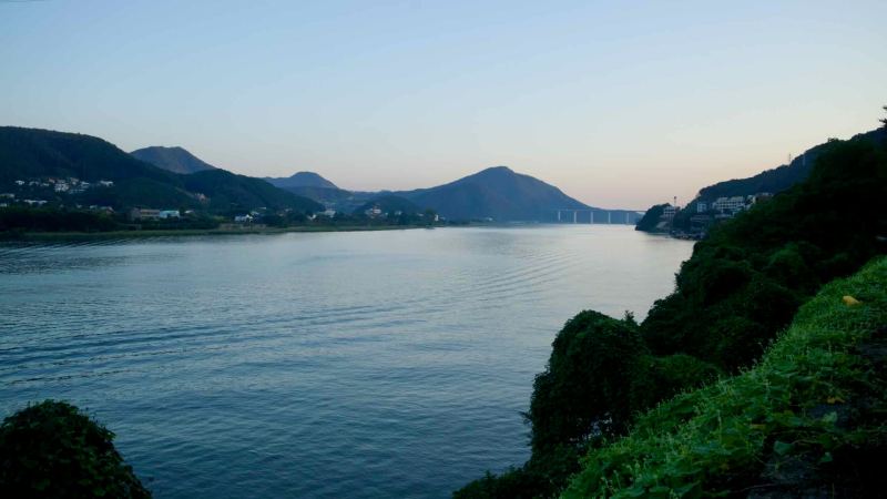 Gentle ripples cross the North Han River at dusk in Namyangju.