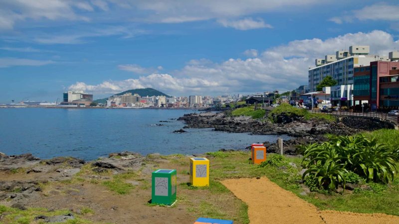 View toward Jeju City from the Hagu‑Aewol shoreline.