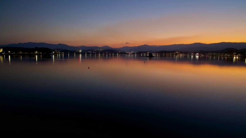 A twilight view over Gyeongpodae Lake in Gangneung.