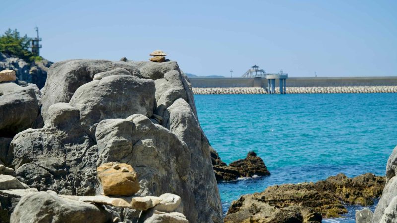 View of the stone forest and concrete breakwater near Chuam Candlestick Rock in Donghae.