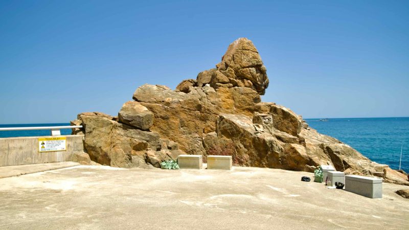 Isabu Lion Rock sits along Isabu Road on the Samcheok coastline by clear blue East Sea.