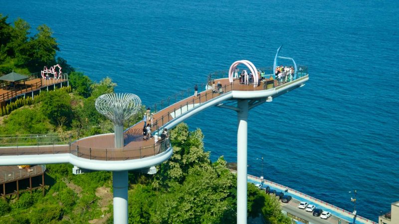 Dojebigol Haerang Observatory holds an elevated walkway extending over the East Sea.