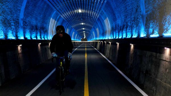 Hangang Bike Path – Hanam Yeoju – Biker In Tunnel Lights A rider in the Gigok Art Tunnel (기곡아트터널) on the Hangang Bike Path.