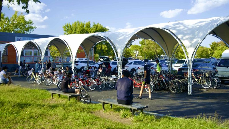 A picture of cyclists and bicycles resting in Jamwon Hangang Park (잠원한강공원) in Seoul, South Korea.