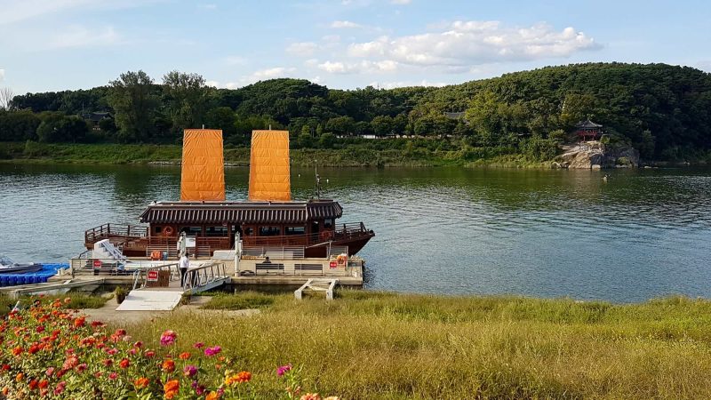 A picture of Hwangpo Sailboats and Silleuksa Temple along the South Han River in Yeoju City, South Korea.