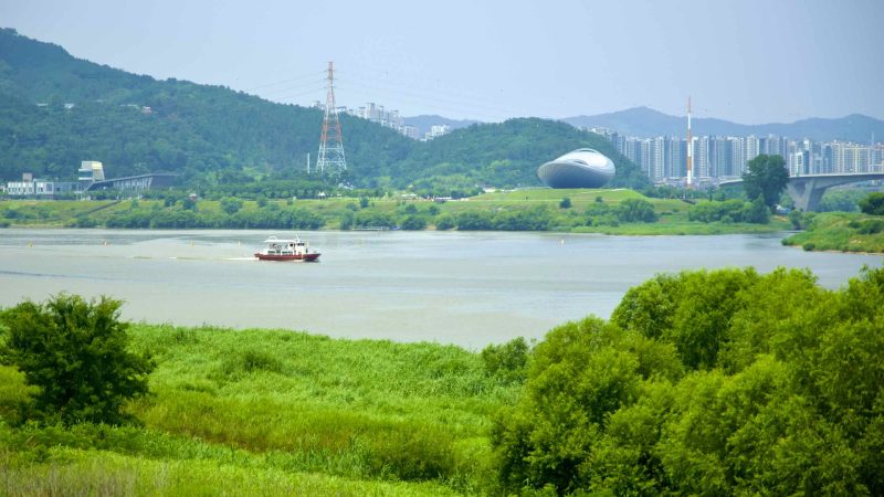 A picture of The ARC Cultural Center (디아크문화관) along the Nakdonggang Bike Path and Nakdong River in Daegu, South Korea.