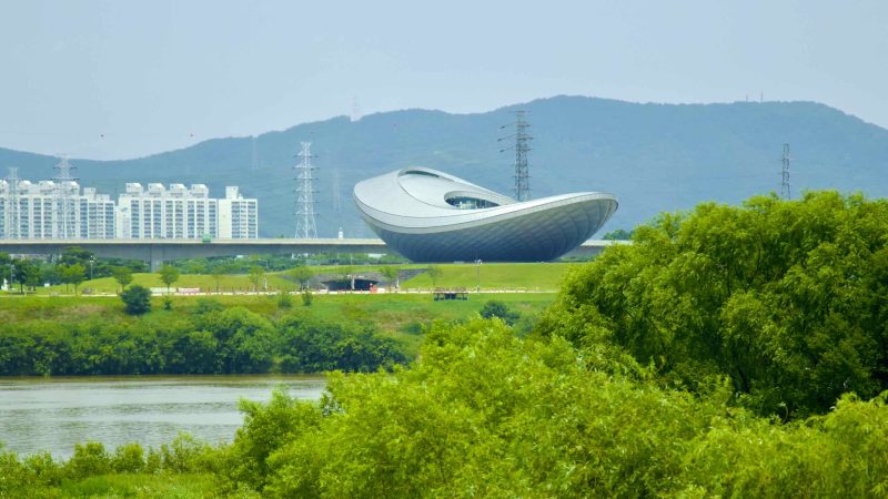 A picture of The ARC Cultural Center (디아크문화관) along the Nakdonggang Bike Path and Nakdong River in Daegu, South Korea.