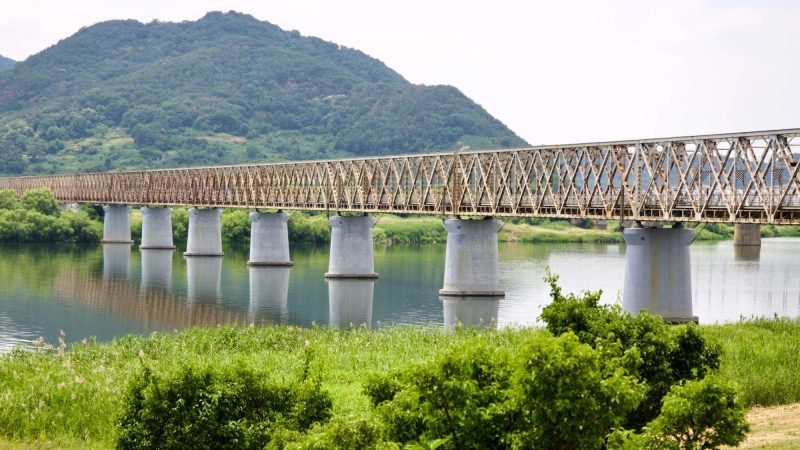 A picture of the Sinnakdong Steel Bridge (신낙동강철교) crossing the Nakdong River (낙동강) on the Nakdonggang Bike Path (낙동강자전거길) between in Miryang and Gimhae Cities, in South Korea.