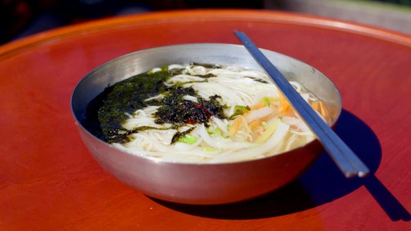 A bowl of myeolchi guksu, a traditional Korean anchovy noodle soup, at Damyang Noodle Street.